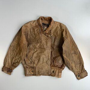 Vintage Adventure Bound brown leather bomber jacket.